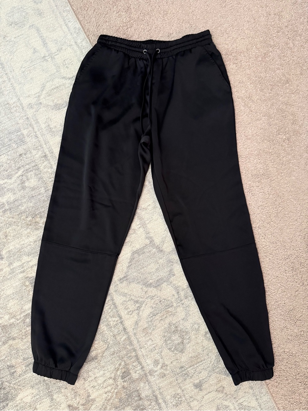 Women’s black satin drawstring joggers